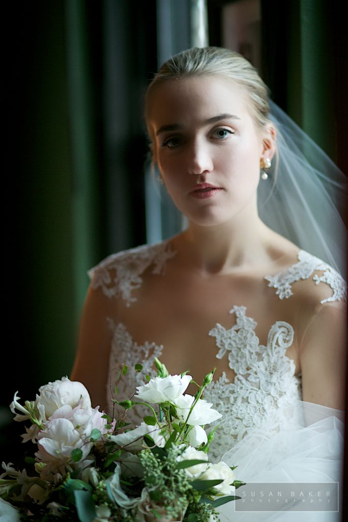bride in wedding gown with makeup