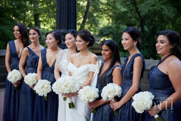 Beautiful Korean bride with her sister and bridesmaids pose in Central Park before wedding at Mandarin Oriental