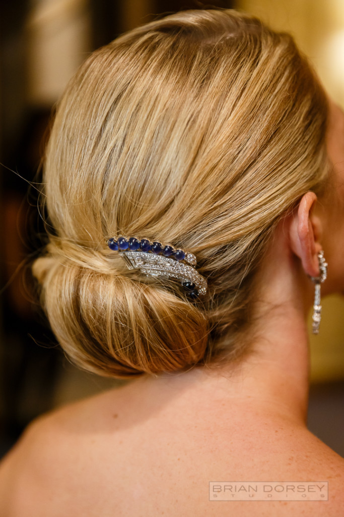 Bride at University Club in New York City with family jewels in her modern chignon