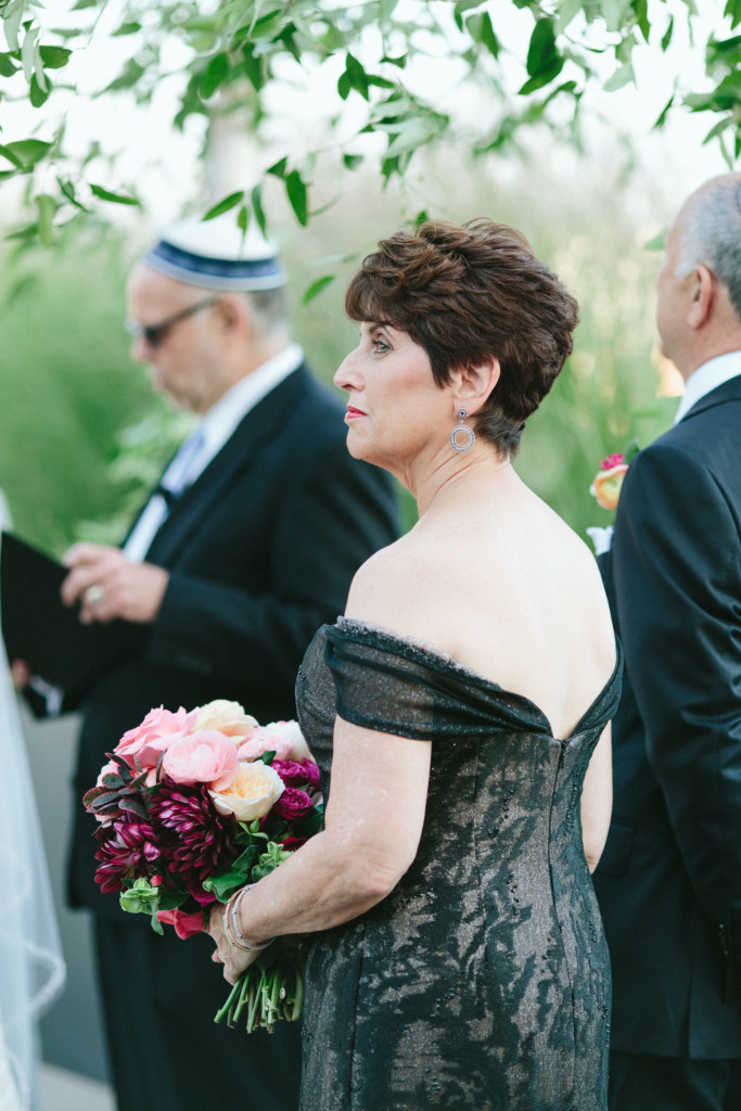 Beautiful mother-of-the-bride with short hair blown out and styled at Tribeca Rooftop in New York City