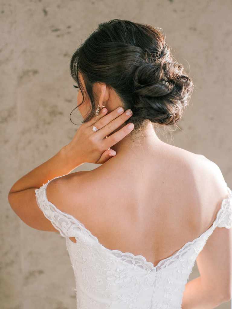 Bride with modern and elegant soft updo on wedding day
